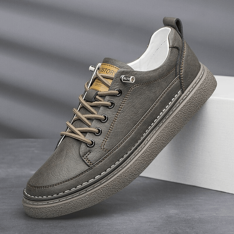 Stylish leather men's sneakers SF1182 with lace-up closure and rubber sole for breathability and comfort in a solid pattern.